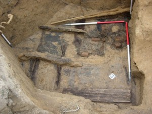 The timber flooring and brick-lined hearth in Avril's area